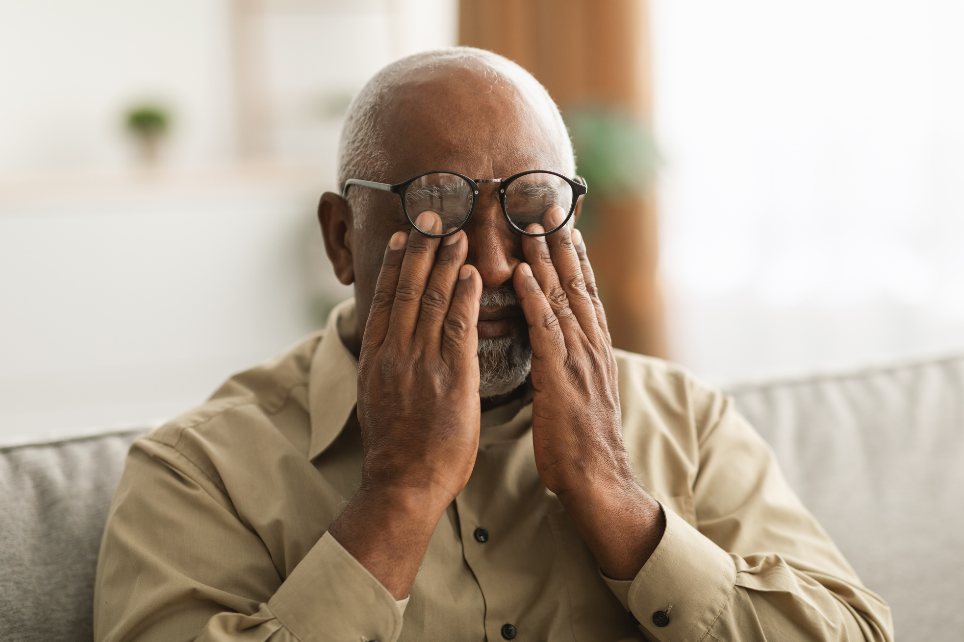 Man experiencing dry eye discomfort